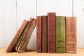 stack of books on the desk over wooden background Royalty Free Stock Photo