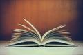 Stack of books on desk with vintage filter Royalty Free Stock Photo