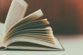 Stack of books on desk with vintage filter Royalty Free Stock Photo