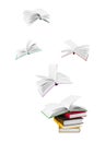 Stack of books and flying books Royalty Free Stock Photo