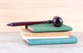 Stack of books and gavel on top Royalty Free Stock Photo