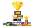 Stack of books with golden cup trophy and medal. Royalty Free Stock Photo