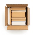 Stack of books inside an open cardboard box, top view Royalty Free Stock Photo