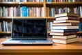Stack of books with laptop on table in library room. AI generated Royalty Free Stock Photo
