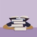 Stack of Books with Mysterious Figure in Purple Hues
