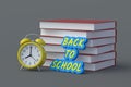 Stack of books near words back to school and alarm clock. Concept of education Royalty Free Stock Photo