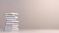 Stack of Books on Neutral Background A neat stack of white books with subtly colored edges sits against a light beige backdrop