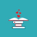 Stack of books with open book and red hearts. Isolated on blue background Royalty Free Stock Photo