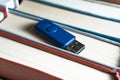 Stack books on wooden background. USB Royalty Free Stock Photo