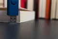 Stack books on wooden background. USB Royalty Free Stock Photo