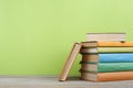 Stack of colorful books on the wooden table. Education background.Back to school. Copy space for text. Royalty Free Stock Photo