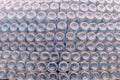 Stack of bottom plastic bottles texture for background