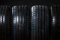 Stack of brand new high performance car tires Royalty Free Stock Photo