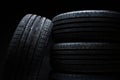 Stack of brand new high performance car tires Royalty Free Stock Photo