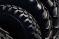 Stack of brand new tractor tires background, close-up Royalty Free Stock Photo