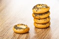 Stack of bread rings sushka with poppy on wooden table Royalty Free Stock Photo