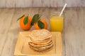 A Stack Of Breakfast Pancakes With Orange Juice Royalty Free Stock Photo