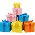 A stack of brightly colored gift boxes with ribbons Royalty Free Stock Photo