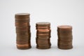 Stack of bronze coins on white background. Coins of five euro cents Royalty Free Stock Photo