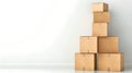 Stack of brown cardboard boxes against a white background. Simple storage concept. Perfect for moving day or delivery Royalty Free Stock Photo