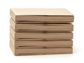 Stack of brown cardboard sheets isolated on white background Royalty Free Stock Photo