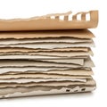 Stack of brown cardboard sheets isolated on white background Royalty Free Stock Photo