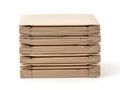 Stack of brown cardboard sheets isolated on white background Royalty Free Stock Photo