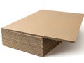 Stack of brown corrugated cardboard sheets on white background Royalty Free Stock Photo