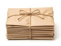 Stack of brown envelopes tied with string isolated on white background Royalty Free Stock Photo