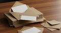 Stack of brown kraft paper envelopes with blank white cards inside on a wooden Royalty Free Stock Photo