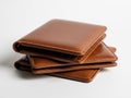 Stack of brown leather wallets isolated on white background Royalty Free Stock Photo