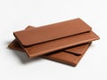 Stack of brown leather wallets isolated on white background Royalty Free Stock Photo