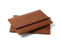 Stack of brown leather wallets isolated on white background Royalty Free Stock Photo