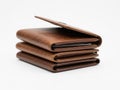 Stack of brown leather wallets isolated on white background Royalty Free Stock Photo