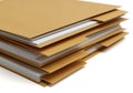 Stack of brown manila folders with documents isolated on white background Royalty Free Stock Photo