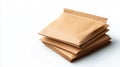 stack of brown paper envelopes on white background, ideal for mailing or packaging. Royalty Free Stock Photo