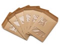 Stack of brown paper envelopes with window, isolated on white background Royalty Free Stock Photo