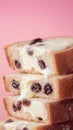 Stack of buttered raisin bread slices on pink background Royalty Free Stock Photo