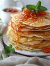 Stack of Buttermilk Pancakes with Apricot Jam and Fresh Fruit on Rustic Table Royalty Free Stock Photo
