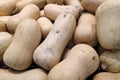 Stack of Butternut Squash on a market stall Royalty Free Stock Photo