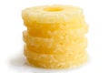 Stack of canned pineapple rings isolated.