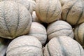 Stack of cantaloupes on a market stall