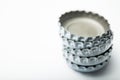 Stack of caps on a white background, alcoholism and depression. Empty space for text Royalty Free Stock Photo