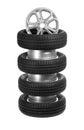A stack of car wheels and tires. Royalty Free Stock Photo