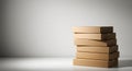 Stack of Cardboard Boxes Against a White Wall Royalty Free Stock Photo
