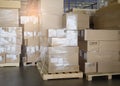 Stack of cardboard boxes on pallet rack in warehouse storage. Shipment. Cargo import and export. manufacturing warehousing