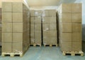 Stack of cardboard boxes ready to be shipped of a warehouse. Package storage room