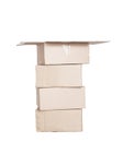 A stack of cardboard boxes on a white background. Open cardboard mail box, concept of customs parcel inspection, isolate Royalty Free Stock Photo