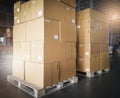 Stack of cardboard boxes on wooden pallet. package box, packaging. Manufactiring warehouse cargo shipment goods. Royalty Free Stock Photo