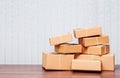 Stack of cardboard boxes on wooden table Royalty Free Stock Photo